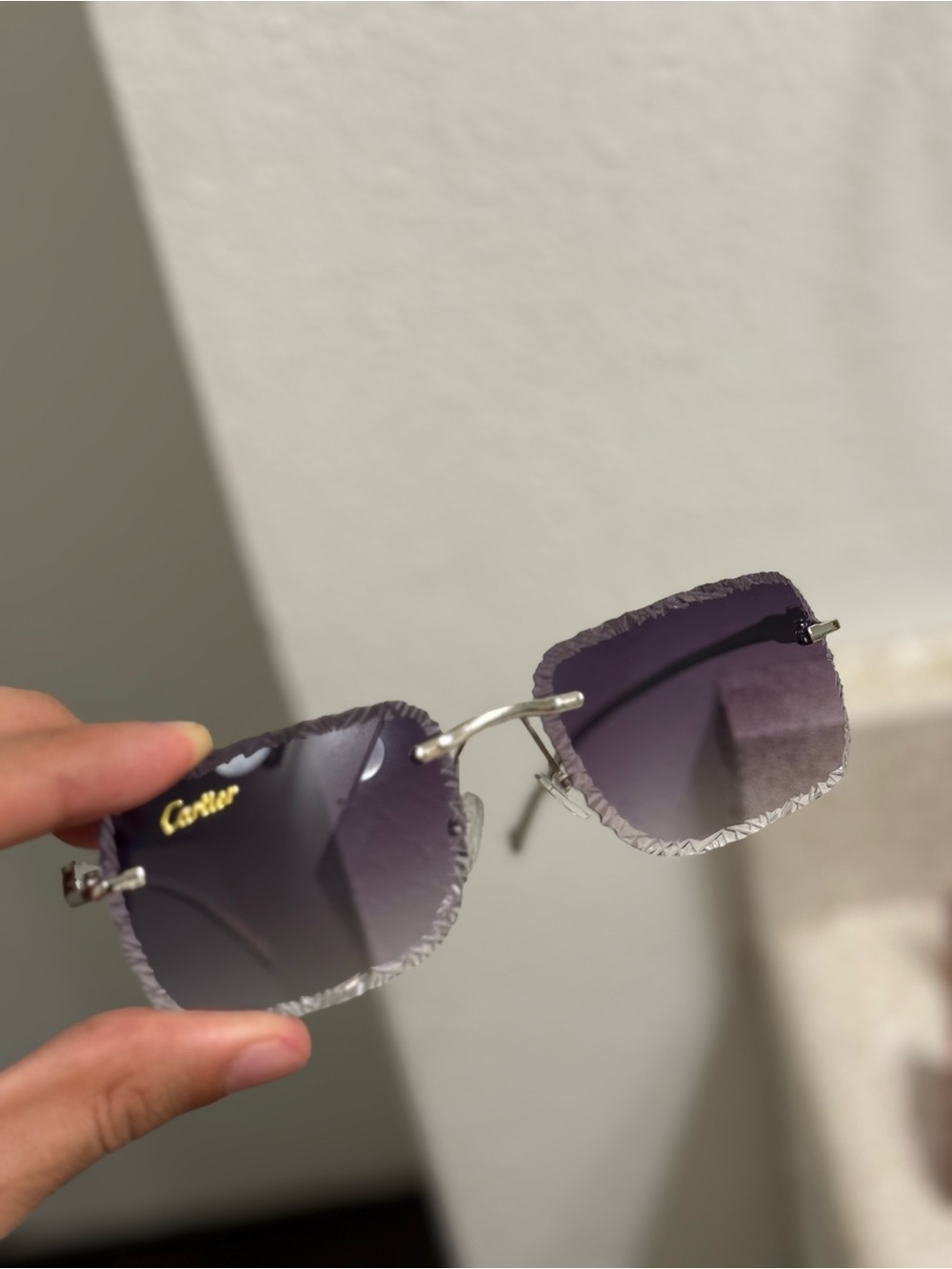 Cartier Men's Rimless Sunglasses with Purple Gradient Lenses